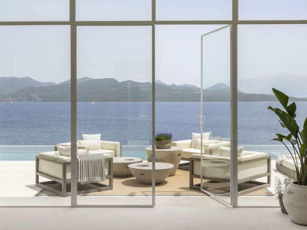 Views out from the generously proportioned communal space on the middle floor of the main house.